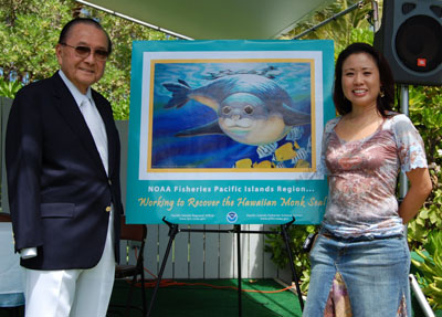 With Senator Dan Inouye at the Recovery Plan Ceremony, with the poster I illustrated for NOAA